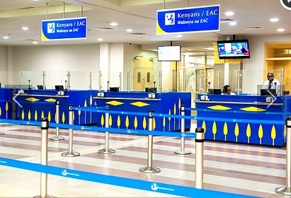 Inside Jomo Kenyatta Airport, with inscriptions in English and Kiswahili Inside Jomo Kenyatta Airport, with inscriptions in English and Kiswahili